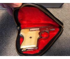 Smith & Wesson MODEL 61- 2 CHROME/NICKEL WITH PEARL GRIPS .22 LR