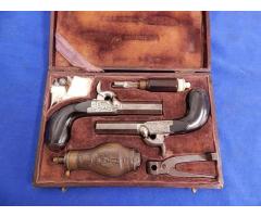 Cased Pair of Belgium Manufactured Persussion Single Shot Pistols